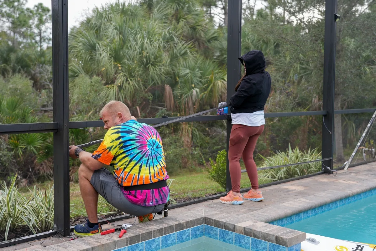 Homeowner with the crew at the pool