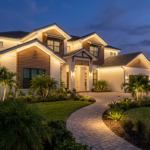 Horizontal 16:9 featured blog header image for an article titled "How to Use Permanent Soffit Lighting to Boost Your Lakewood Ranch Curb Appeal". Modern, professional, editorial photography style. No text overlays. Clean composition suitable for a home services blog header.