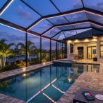 Horizontal 16:9 featured blog header image for an article titled "Lighting Up Your Lanai: The Best LED Solutions for Venice Pool Cages". Modern, professional, editorial photography style. No text overlays. Clean composition suitable for a home services blog header.